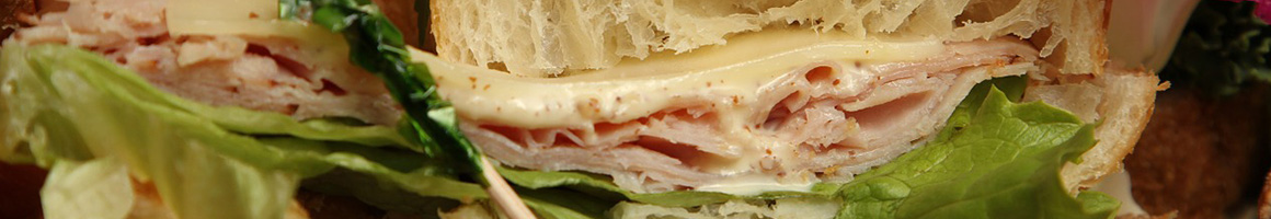 Eating Deli German Sandwich at LOCAL Eats Merch Vibes restaurant in Marina, CA.